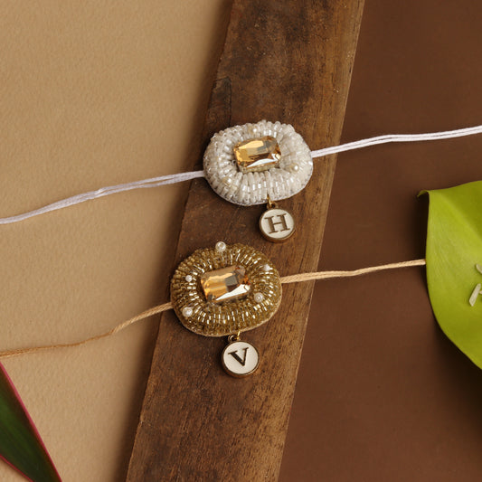 Initial Rakhi (A-K)